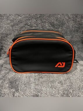 Atley James Harmon toiletry organizer bag black and orange